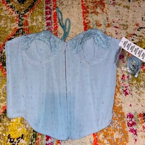 •small blue corset never touched in great condition with tags still on